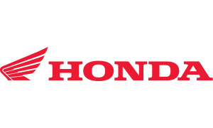 Das Logo kombiniert den ikonischen, mehrfach gestuften Flügel mit einem massiven, roten Schriftzug in einer breiten Serifenschrift. Es strahlt durch das kräftige Signalrot Dynamik und technische Zuverlässigkeit aus.