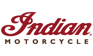 Dieses Design setzt auf einen nostalgischen Heritage-Look mit einem elegant geschwungenen Markenschriftzug in dunklem Weinrot. Die Kombination aus klassischer Schreibschrift und sachlicher Blockschrift betont die lange Tradition und Handwerkskunst der Marke.